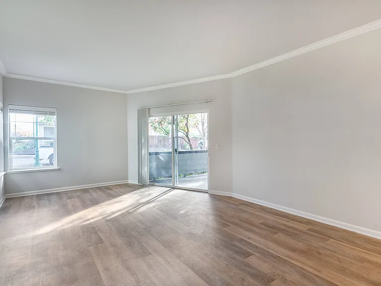 Large entry way with access to the patio. Allowing plenty of natural light to grace your future unit