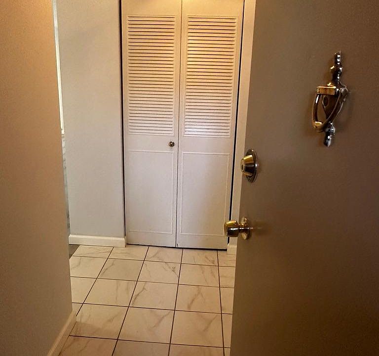 Entry with tiled floor.