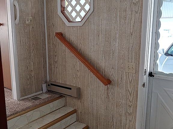 Front hall with coat closet