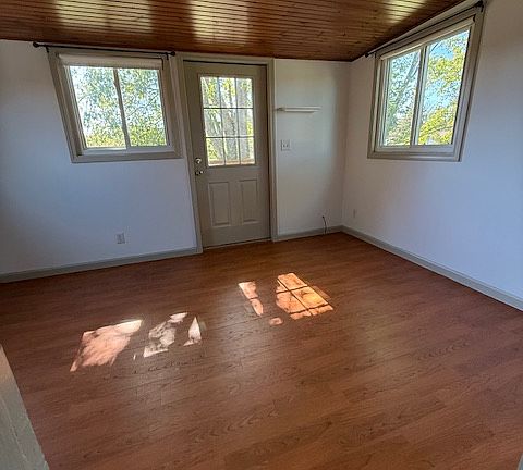 Bedroom, door goes to the balcony.