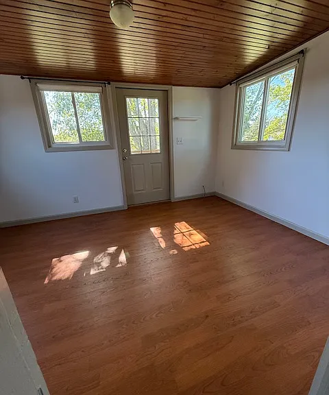 Bedroom, door goes to the balcony.