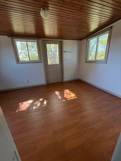 Bedroom, door goes to the balcony.