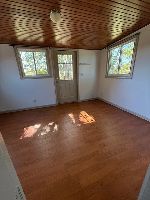 Bedroom, door goes to the balcony.