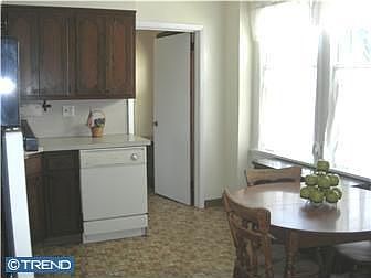 Kitchen - entrance to laundry area, 1/2 br, family room.