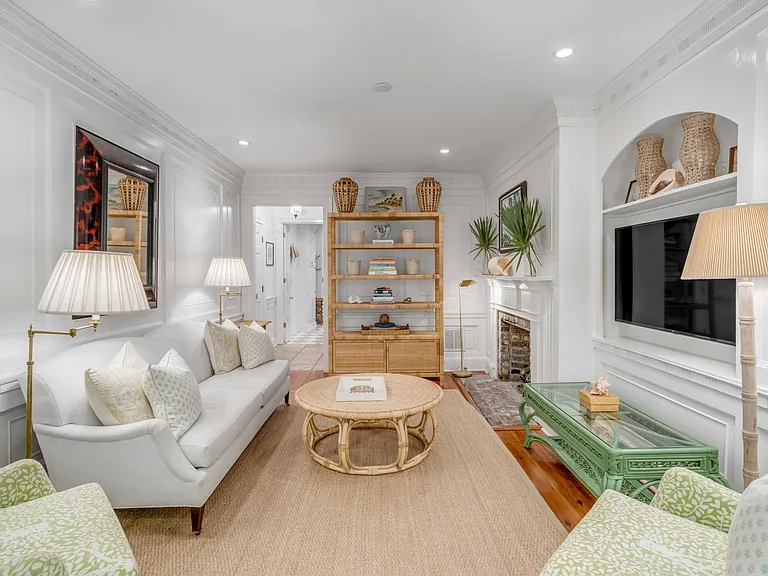 First floor living room with Smart TV and gas fireplace.