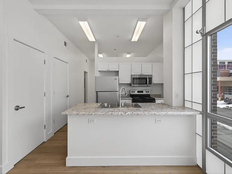 116 E 3rd St — Photo 11