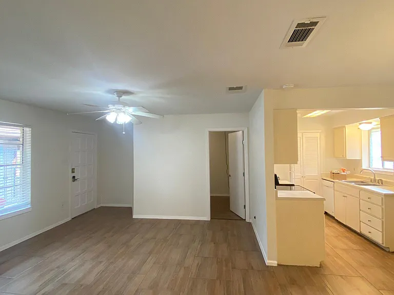 Living Room, with view of bedroom 3 and kitchen
