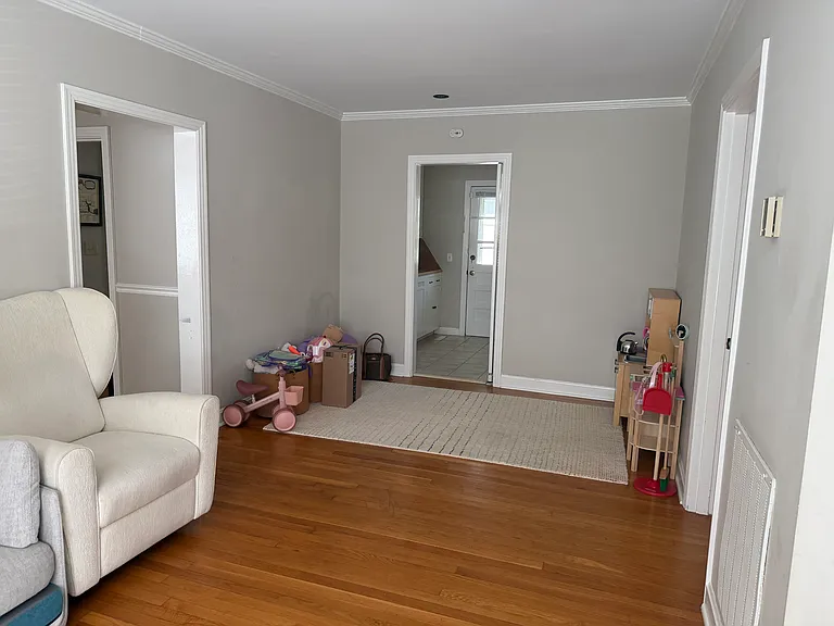 Another view of the den area. Great space for a home office, table or toys.
