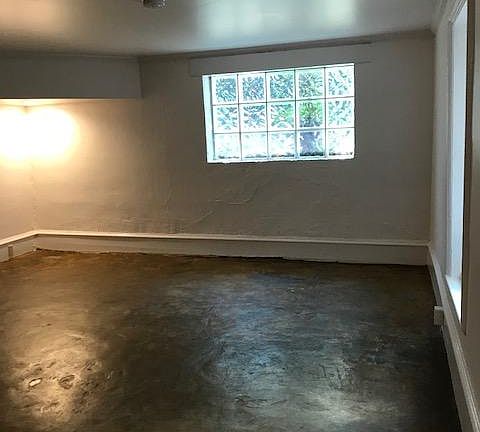 Large glass block window provides lots of light with privacy.