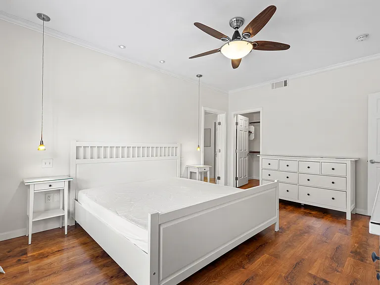 King size bed with dual night stands, large walk in closet, and 2 large dressers for additional storage.