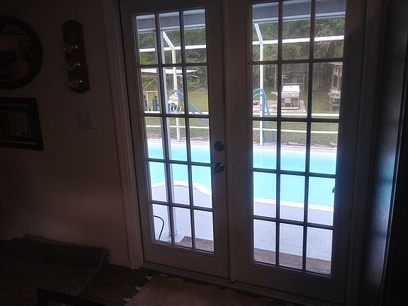Newer French doors to the pool