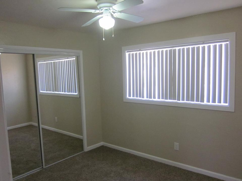 mirror closet, ceiling fans