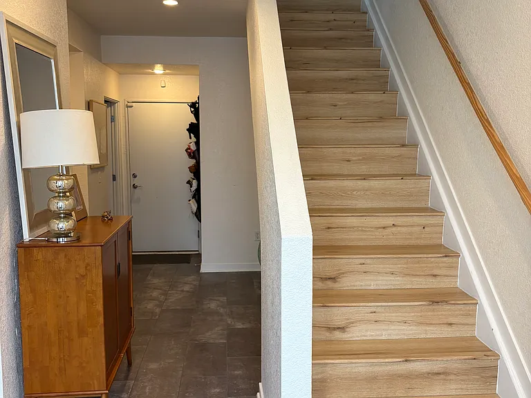 First floor hallway & stairs leading to second floor
