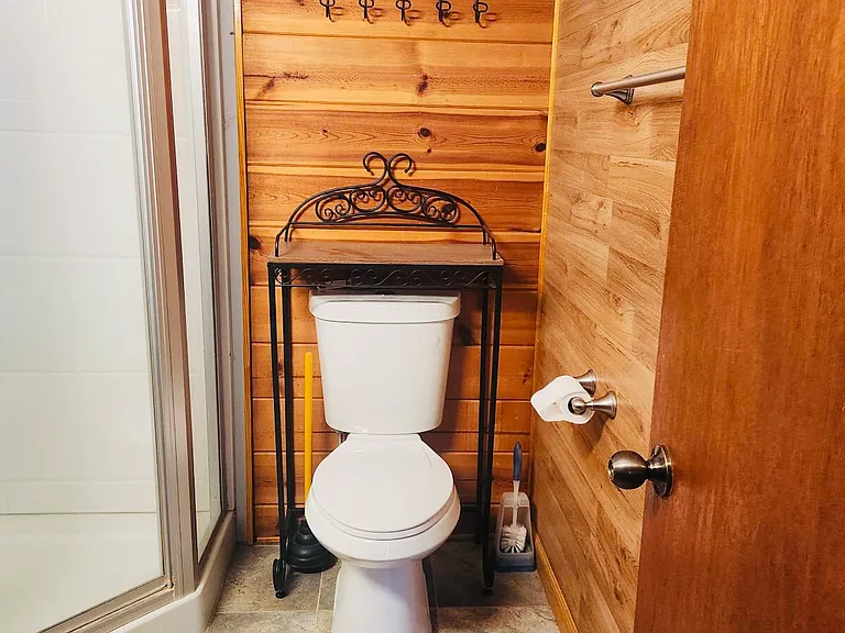Bathroom has new toilet and vinyl flooring. Very quaint and heater to keep you warm on cold nights.