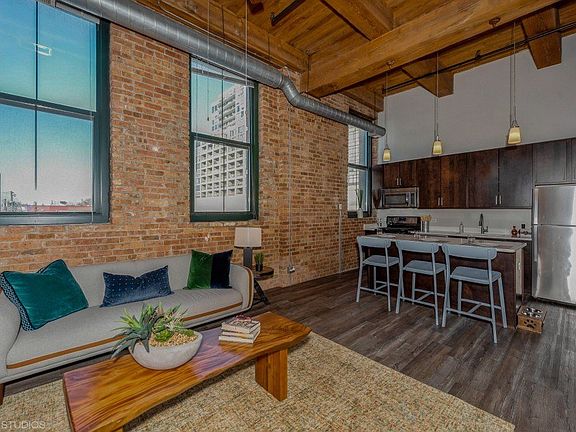 Exposed brick walls and ceiling beams