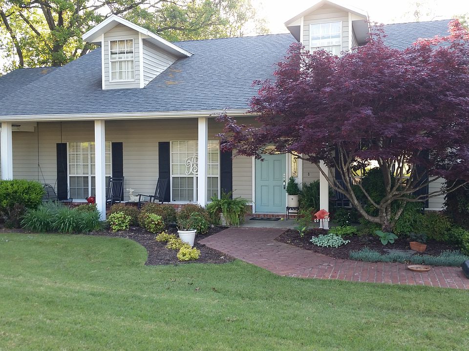 Brick walk to front of house