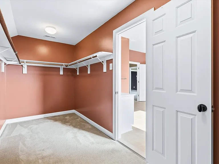 Primary walk-in closet