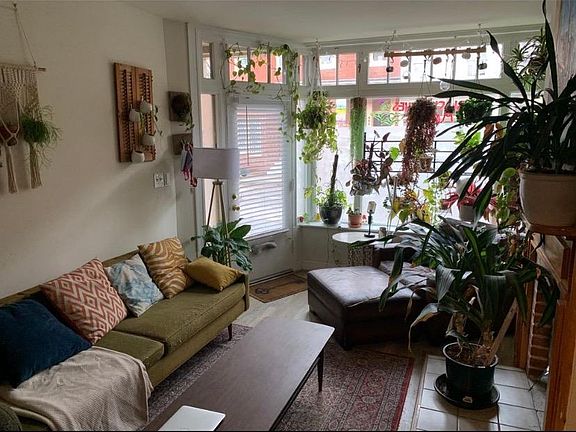 Front room, facing front door/street as styled by previous tenant