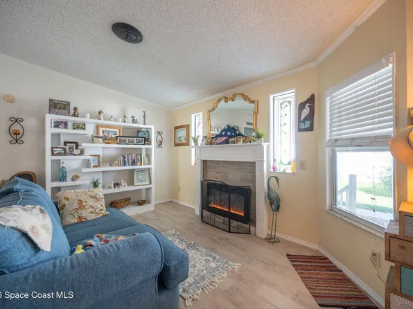 604 Amaryllis Dr, Barefoot Bay, FL 32976