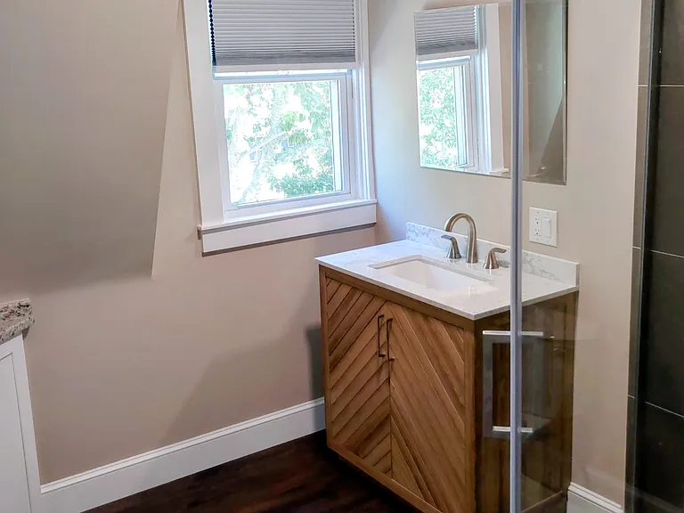 Spacious bathroom with corner shower