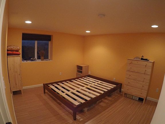Large window in bedroom.