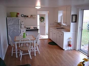 This is the dazzling kitchendining area, doorway leads to the 10 x 24 family room where you can rela