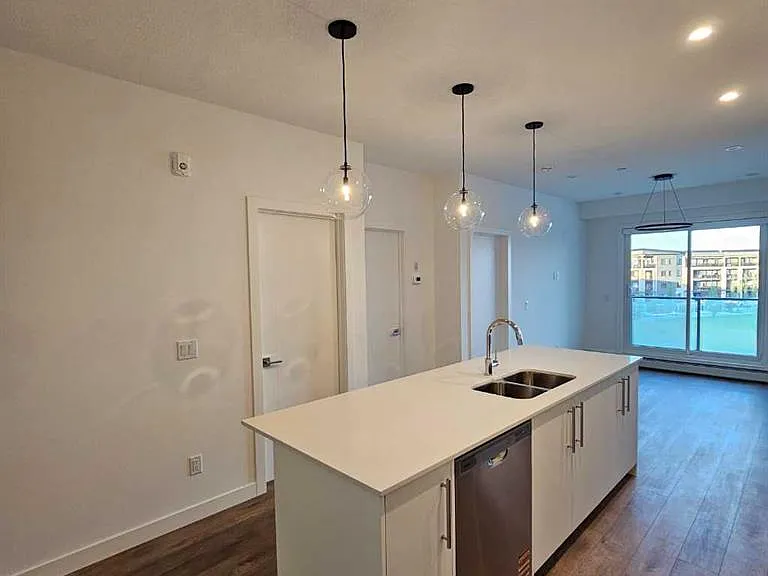 265 Wolf Willow Blvd SE — Photo 1
