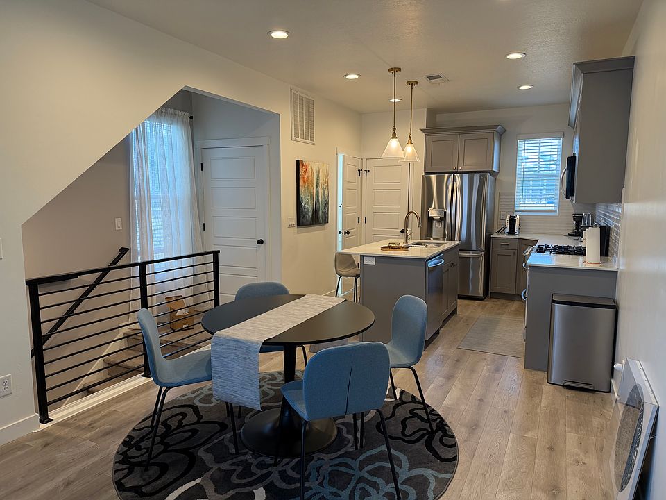Dining & Kitchen Island, Gas Range, Oven, LG appliances, Microwave, furnished kitchen (utensils, plates, pots, pans), coffee maker, blender