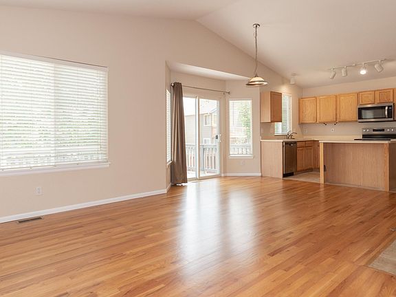 Sliding glass door opens to wide deck