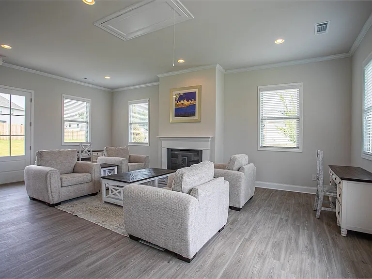Warm, inviting clubhouse interior with a cozy, residential feel.