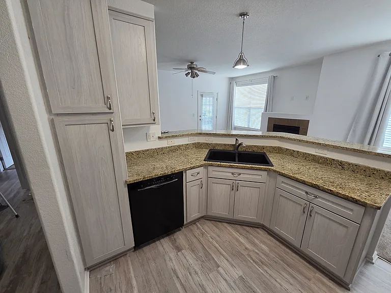 Pantry has sliding racks to increase storage.