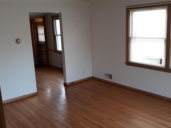 Living room, facing kitchen/dining