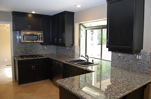 Slab granite, stainless appliances
