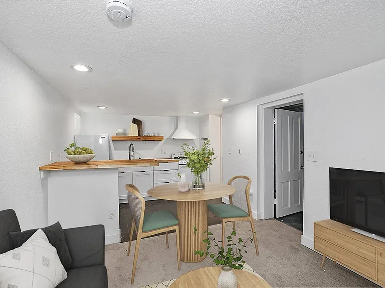 This image shows a virtually furnished space. This space come unfurnished.