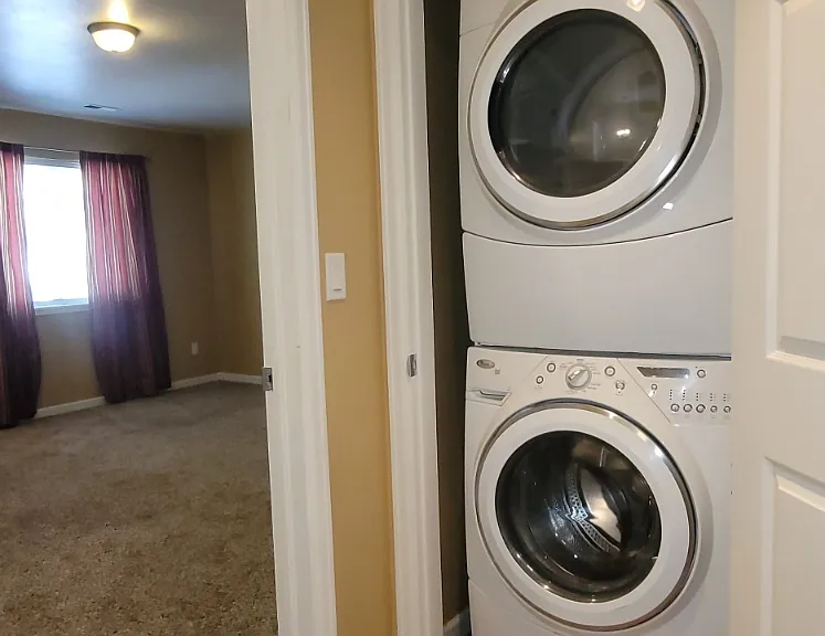 Laundry is conveniently next to the master bedroom.