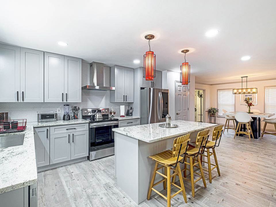 Sleek, modern kitchen with premium appliances and ample counter space.