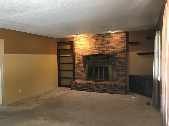 Living room w/wood fireplace