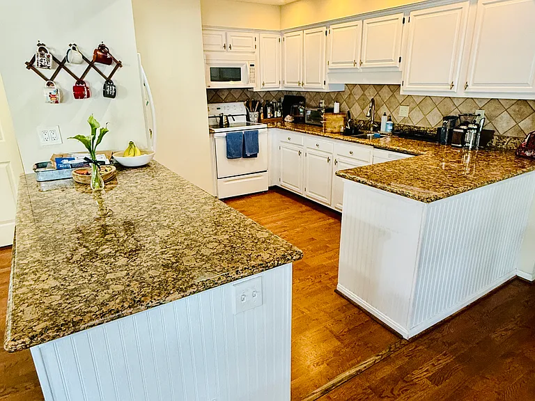 Open concept, granite countertops, full bar
