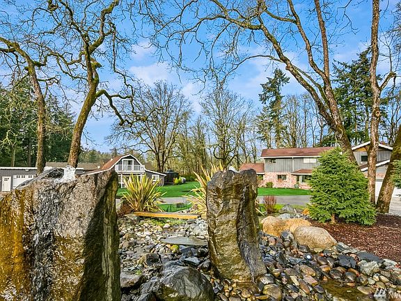 Wait until you see this water feature! Custom built, not a single stone left unturned.