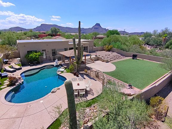Drone view of backyard sitting on almost 1 acre of land
