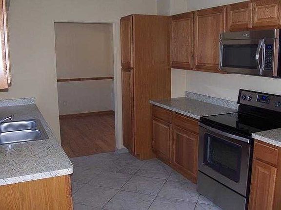 Kitchen has new fixtures and appliances