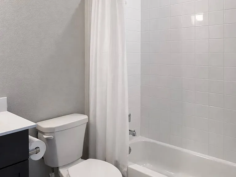 Shared restroom with one more person.