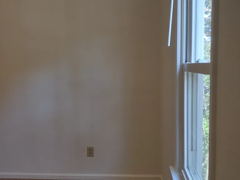 This photo has not been altered in any way: no edits or filters have been applied to try to deceive the viewer by having the room appear larger or brighter than it actually is.