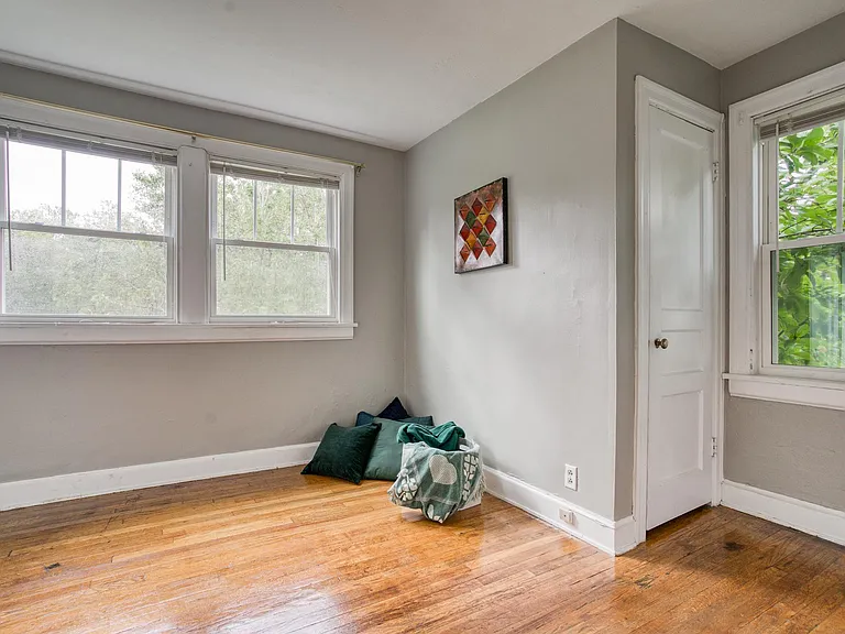 Front bedroom with one walk in closet and more storage.