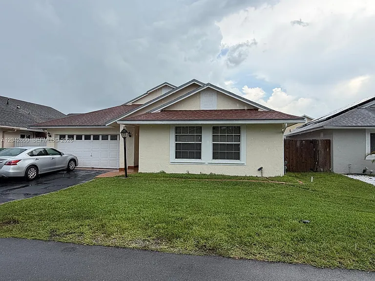19058 NW 77th Pl — Photo 1