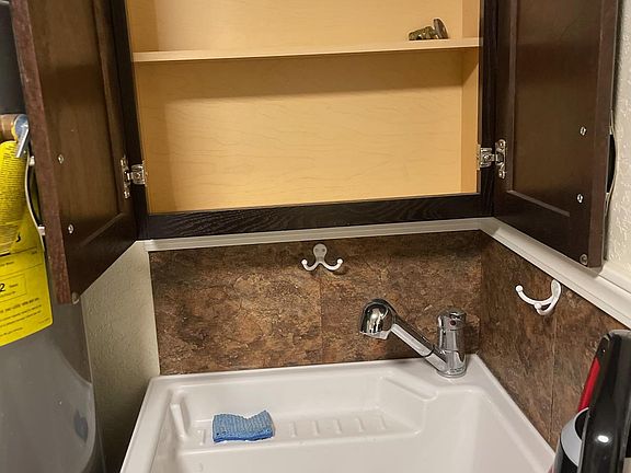 Utility sink with above sink storage