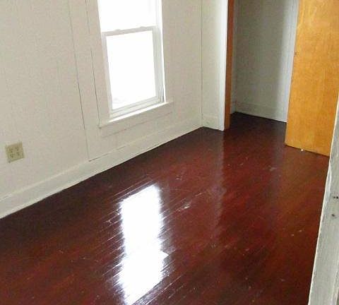 Master bedroom with double closed-lots of light-fresh paint 