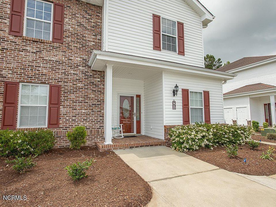 1st image of 8855 Radcliff Dr NW Unit 8B