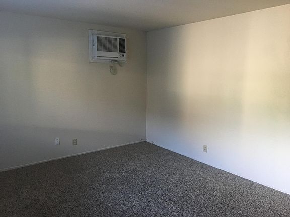 living room with wall A/C