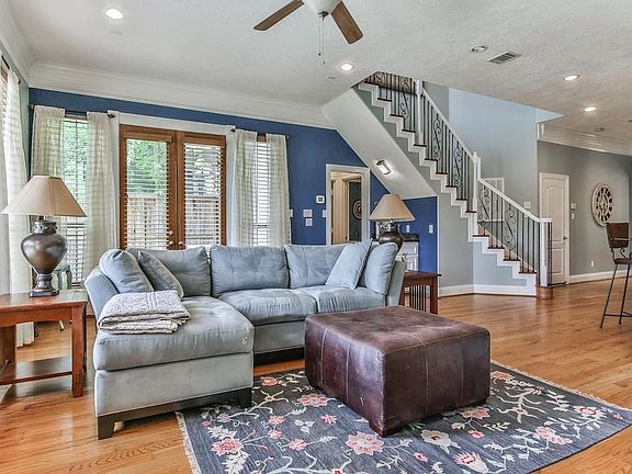 Living Room surrounds fireplace and offers a wonderful gathering space.